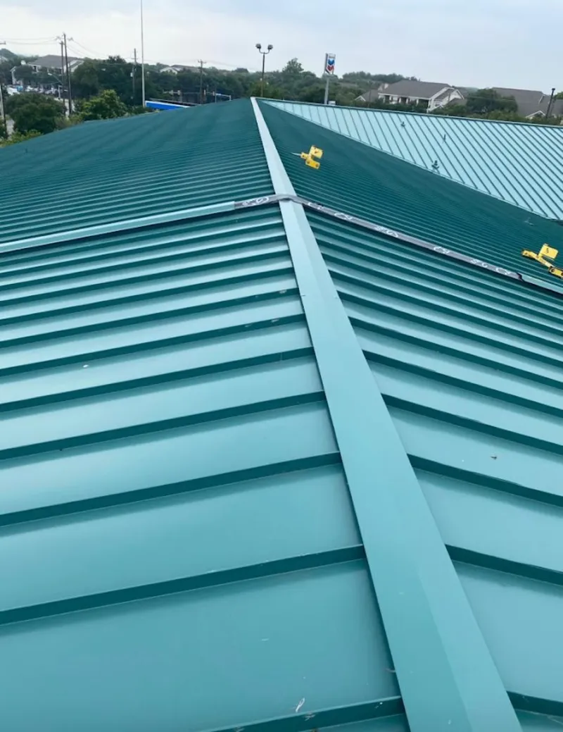Green commercial metal roof ridge and valley for Metal Roof Repair in Los Alamos